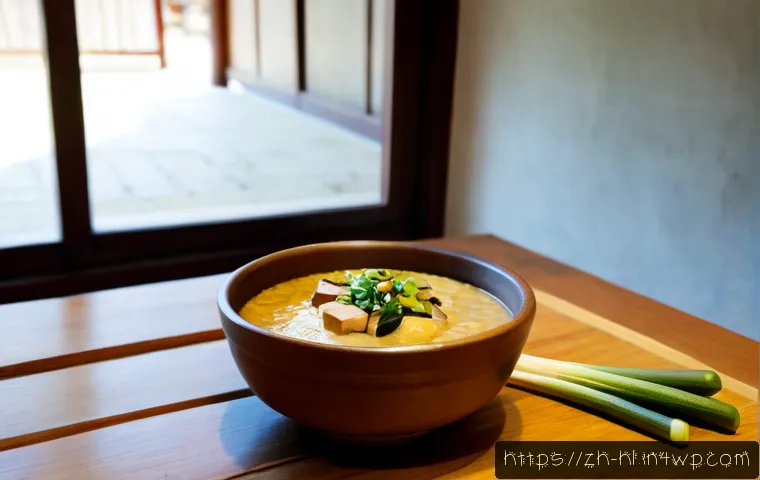 전통 장류를 활용한 요리 레시피 - Photorealistic Korean home kitchen scene, a steaming earthenware bowl of soybean paste stew with tof...